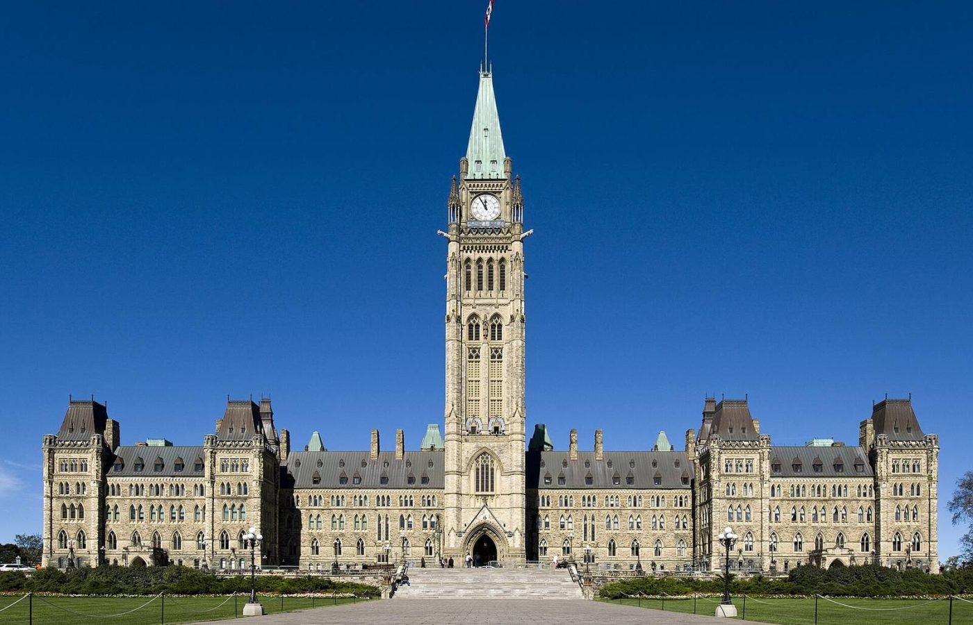 Centre Block of Canada's Parliament with the Peace Tower in Ottawa under a clear blue sky