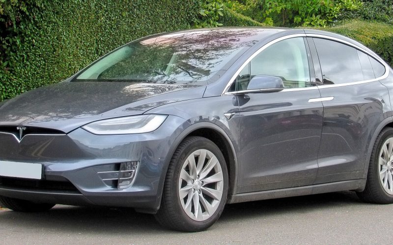 Front three-quarter view of a grey 2017 Tesla Model X parked on a street.