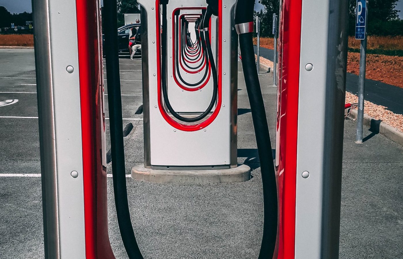 Tesla Supercharger stalls, the kind of DC fast charging Cybercabs rely on